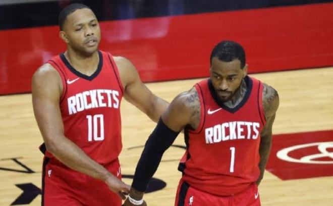 甘超对阿奇姆彭做闭嘴手势，钟义浩扳平比分后做同样手势回击